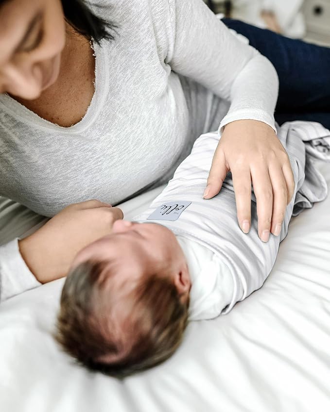 The Ollie Swaddle – Adjustable Baby Swaddle for Newborns | Pediatrician-Approved for Safe Sleep | Easy Closure | Arms-Out | Lightweight, Machine-Washable | Easy Diaper Access