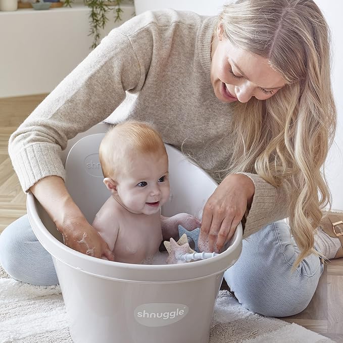 Shnuggle Newborn Baby Bath | Built in Support Bump and Soft Backrest | Suitable from Newborn | Bath Seat Support Includes Plug | Blossom Pink