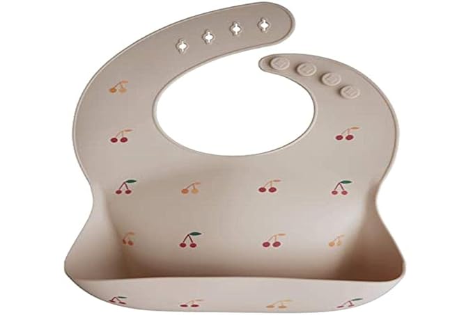 mushie Silicone Baby Bib | Adjustable Fit Waterproof Bibs (Cherries)