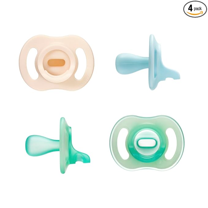 Tommee Tippee Stay Put Pacifier Set, Contains 2 Ultra-Light StayPut Glow in the Dark Pacifiers and 2 Ultra-Light StayPut Pacifiers, 0-6 Months, Colors May Vary, One-Piece Silicone Design, Pack of 4