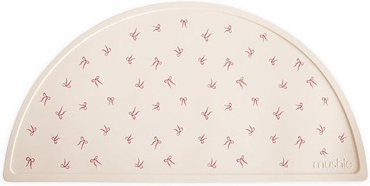 mushie Silicone Placemat for Kids | BPA-Free Non-Slip Design (Bows)