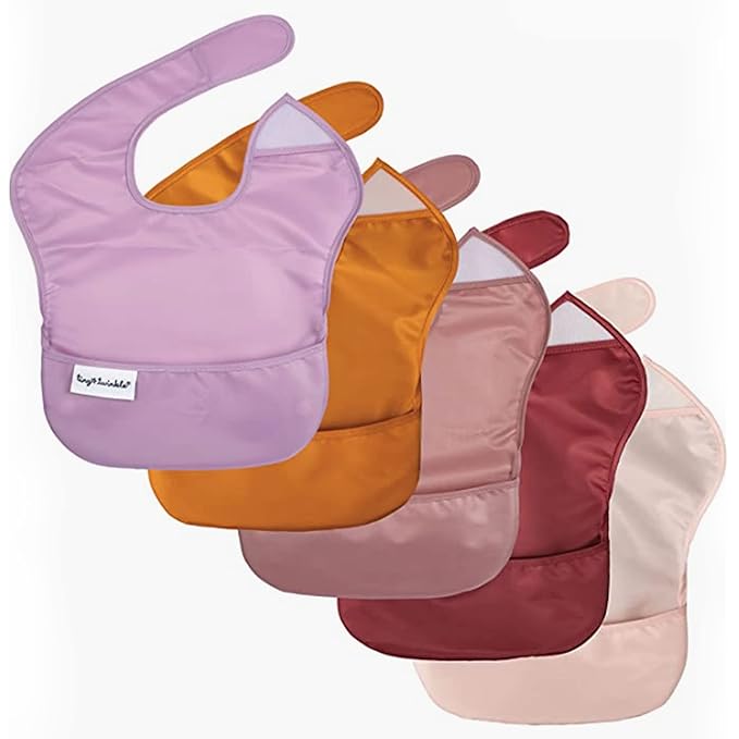 Tiny Twinkle Mess-Proof Baby Bib - Waterproof Bib for Baby Boy or Girl - Machine Washable, Adjustable Closure - PVC, BPA & Phthalate Free - Great for Travel - Baby Food Bibs (5 Pack, Girl Solids)