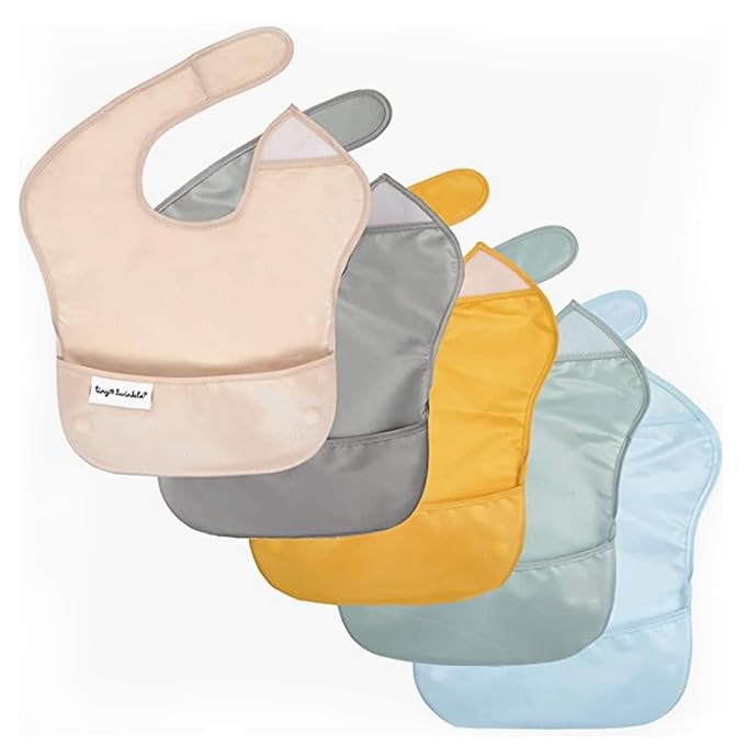Tiny Twinkle Mess-Proof Baby Bib - Waterproof Bib for Baby Boy or Girl - Machine Washable - Adjustable Closure - PVC, BPA & Phthalate Free - Great for Travel - Baby Food Bibs (5 Pack, Unisex Solids)