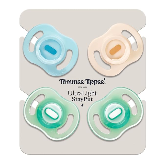 Tommee Tippee Stay Put Pacifier Set, Contains 2 Ultra-Light StayPut Glow in the Dark Pacifiers and 2 Ultra-Light StayPut Pacifiers, 0-6 Months, Colors May Vary, One-Piece Silicone Design, Pack of 4