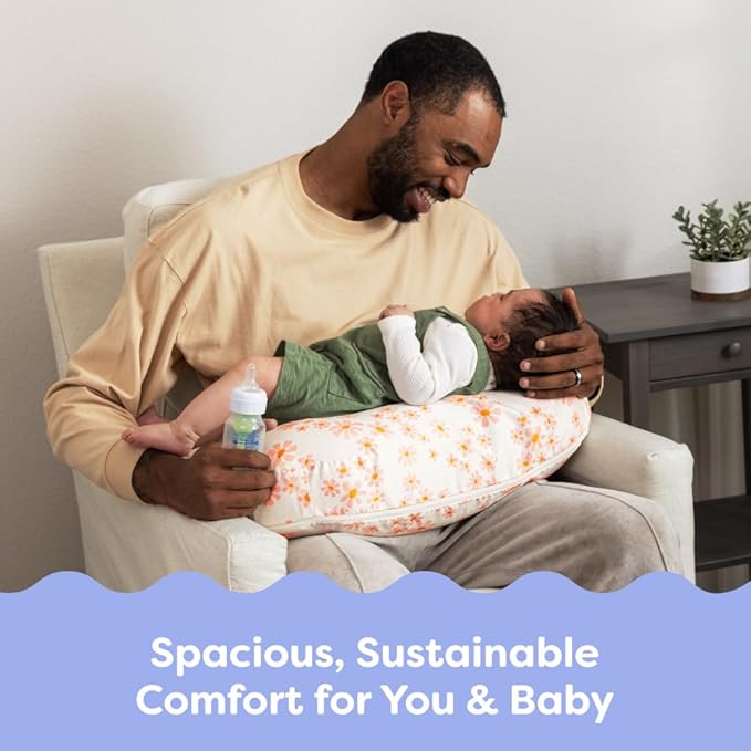 Boppy Nursing Pillow - Firm, Ergonomic U-Shaped Bottle and Breastfeeding Pillow with High Lift for Comfort and Support, Spacious Surface - Soft Pink Daisies