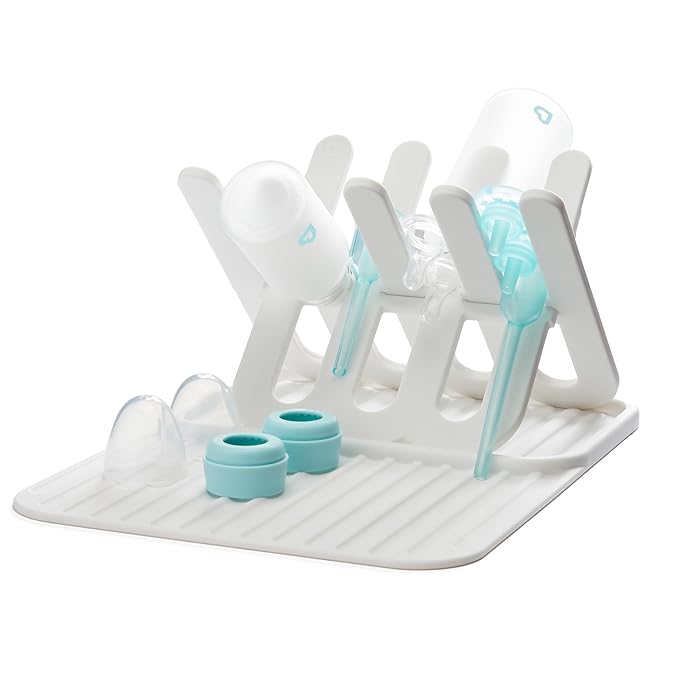 Munchkin Bottle Drying Rack and Mat, Holds 8 Bottles, Pump Parts, Pacifiers, & Accessories, Space Saving Folding Design, Home and Travel Use, Silicone, White