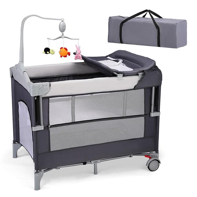 JOYMOR 5-in-1 Pack and Play with Bassinet and Changing Table, Lightweight Travel Crib, Foldable Baby Playard, Waterproof Changing Top, Carry Bag & Wheels
