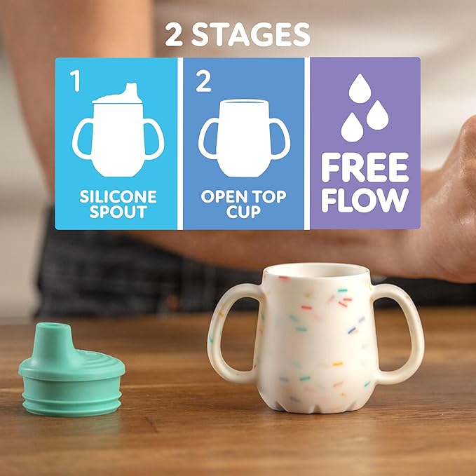 Nuby First Training Cup - Silicone Cup with Free-Flow Spout and Easy-Grip Design - 2 oz - 6+ Months - Coral and Sprinkles