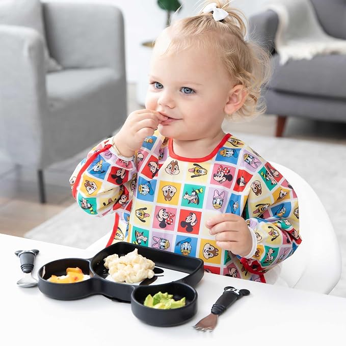 Bumkins Disney Sleeved Bib for Girl or Boy, Baby and Toddler for 6-24 Mos, Essential Must Have for Eating, Feeding, Baby Led Weaning Supplies, Long Sleeve Mess Saving, Mickey and Friends Check Mates