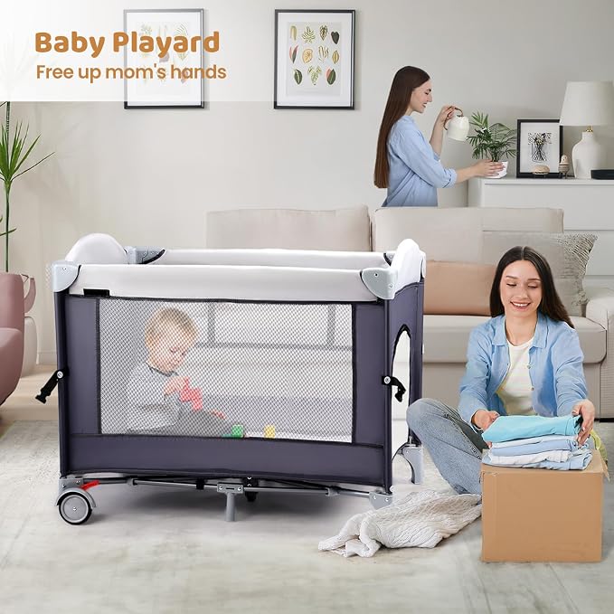 JOYMOR 5-in-1 Pack and Play with Bassinet and Changing Table, Lightweight Travel Crib, Foldable Baby Playard, Waterproof Changing Top, Carry Bag & Wheels