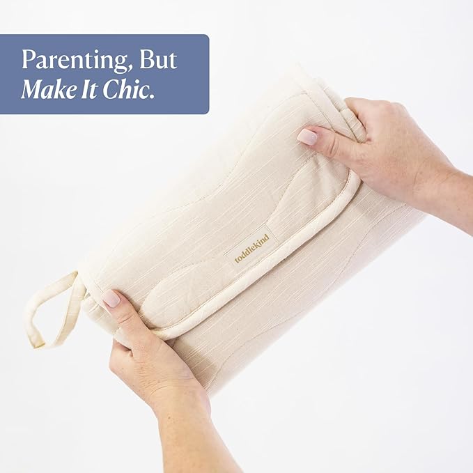 Toddlekind Mini Maven Portable Changing Pad ??Organic Cotton & Water-Resistant Polyester ??Travel-Friendly, Foldable Change Mat ??Tofu Beige Stripes with Wave Stitching ??Chic, Durable, Easy to Clean