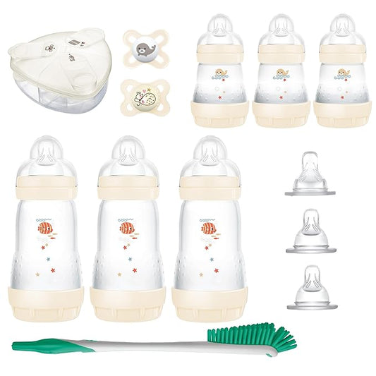 MAM Newborn Essentials Anti-Colic Baby Bottle & Pacifier Set 6 Easy Start Bottles (5oz & 9oz) 8 SkinSoft Nipples (Slow–X-Fast Flow) | Self-Sterilizing, Glow in The Dark Pacifiers & Brush