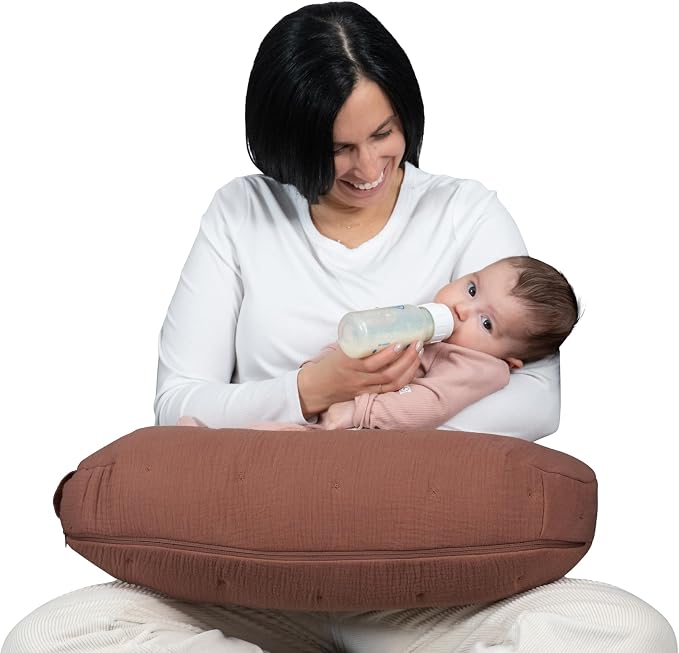 Boppy Nursing Pillow Luxe - Ergonomic Bottle & Breastfeeding Pillow with High Lift & Firm Support - Water-Resistant with Washable Cotton Muslin Cover - Baby Safety Alliance Verified - Chestnut