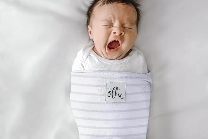 The Ollie Swaddle – Adjustable Baby Swaddle for Newborns | Pediatrician-Approved for Safe Sleep | Easy Closure | Arms-Out | Lightweight, Machine-Washable | Easy Diaper Access