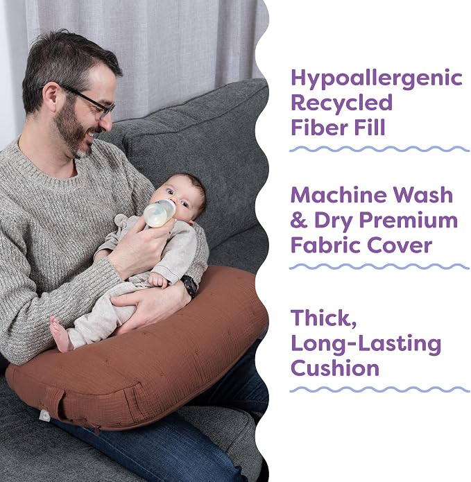 Boppy Nursing Pillow Luxe - Ergonomic Bottle & Breastfeeding Pillow with High Lift & Firm Support - Water-Resistant with Washable Cotton Muslin Cover - Baby Safety Alliance Verified - Chestnut