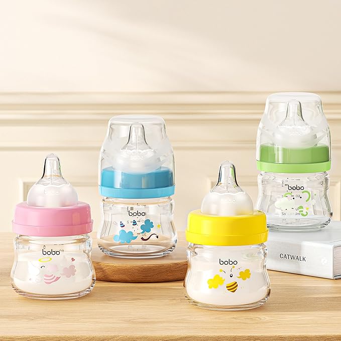YOHKOH Glass Baby Bottles with Slow Flow Nipple, Newborn Anti-Colic Baby Bottles for 0+ Months, Wide Neck Feeding Bottle, Clear (Red, 2.7oz (Pack of 2))
