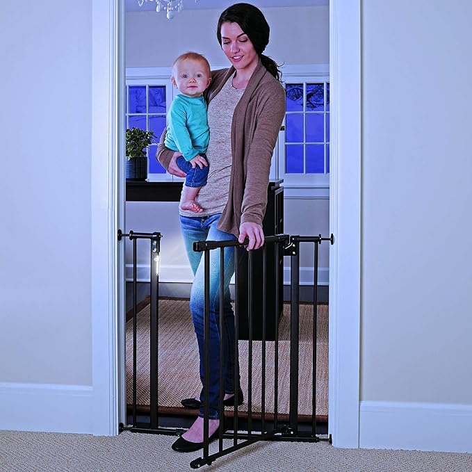 Toddleroo by North States - Light the Way Baby Gate: Metal Safety Gate for Stairs & Doorways with Light Sensing LED - Adjustable 28.5 to 38.25 Inches Wide - 29.3 Inches Tall - Matte Bronze