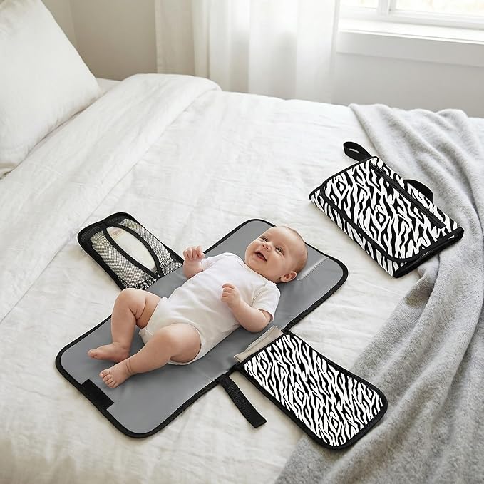 Love By Emi Portable Diaper Changing Pad, A Waterproof Travel Station and Foldable Clutch with Storage Pockets, an On-The-Go Baby Essential for Newborns and Toddlers with Cute Animals Pattern (White)