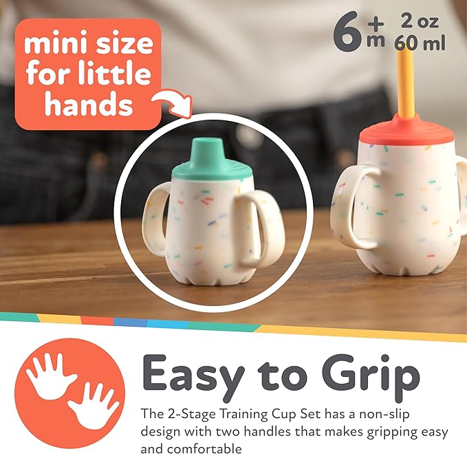 Nuby First Training Cup - Silicone Cup with Free-Flow Spout and Easy-Grip Design - 2 oz - 6+ Months - Purple and Pink