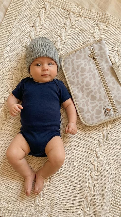 Love By Emi Portable Diaper Changing Pad, A Waterproof Travel Station and Foldable Clutch with Storage Pockets, an On-The-Go Baby Essential for Newborns and Toddlers with Cute Animals Pattern (Brown)
