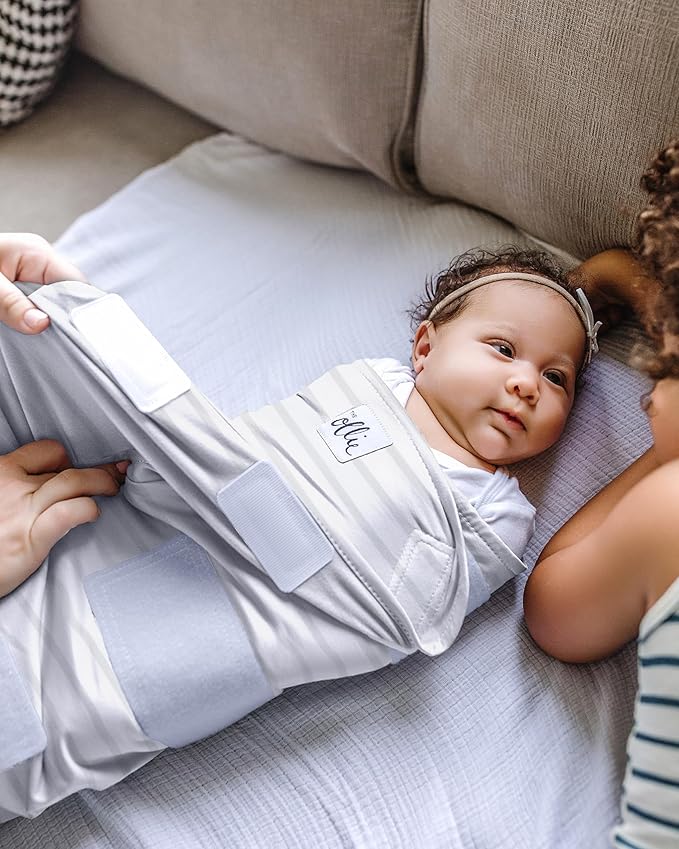 The Ollie Swaddle – Adjustable Baby Swaddle for Newborns | Pediatrician-Approved for Safe Sleep | Easy Closure | Arms-Out | Lightweight, Machine-Washable | Easy Diaper Access