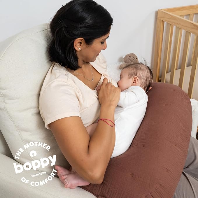 Boppy Nursing Pillow Luxe - Ergonomic Bottle & Breastfeeding Pillow with High Lift & Firm Support - Water-Resistant with Washable Cotton Muslin Cover - Baby Safety Alliance Verified - Chestnut