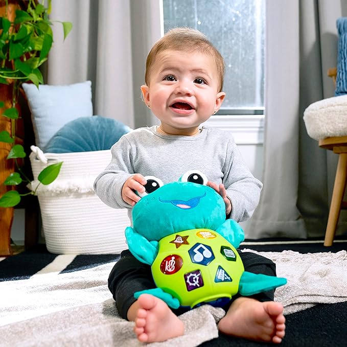 Baby Einstein Ocean Explorers Neptune?™s Cuddly Plush Composer Musical Discovery Toy, Ages 6 Months and up