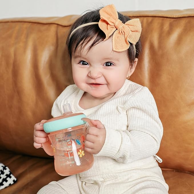 The First Years - Soft Spout Sippy Cup - Toddler Trainer Cup for 6+ Months -With Handles and Leak Proof Lid - 7 Oz - Floral Ladybug Print - 2 Count